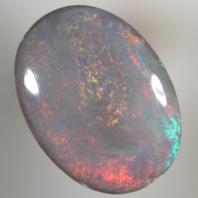 SOLID SEMI BLACK OPAL Bright and rich burning copper orange and fire red over a touch of green blue